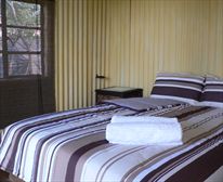 Safari Boma Cabins Queensize bed - Bee Tree Cottage
