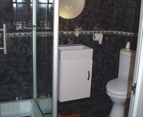 Moulin Rouge Bathroom. - El Gran Chaparral Guest House