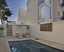 Pool - 1 Bedroom Luxury Apartment in Sandton/Parktown North